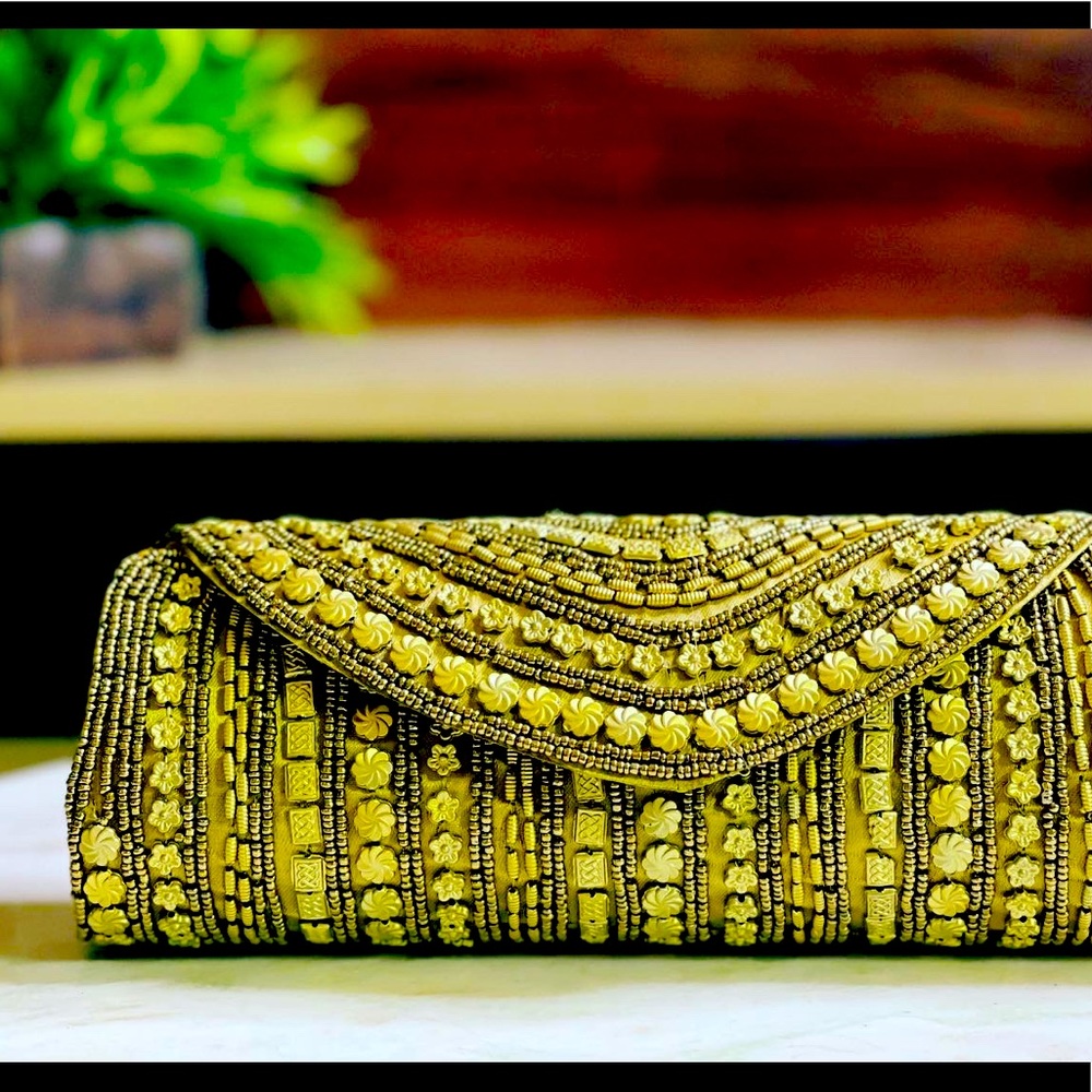 Beautiful Gold Beaded clutch
